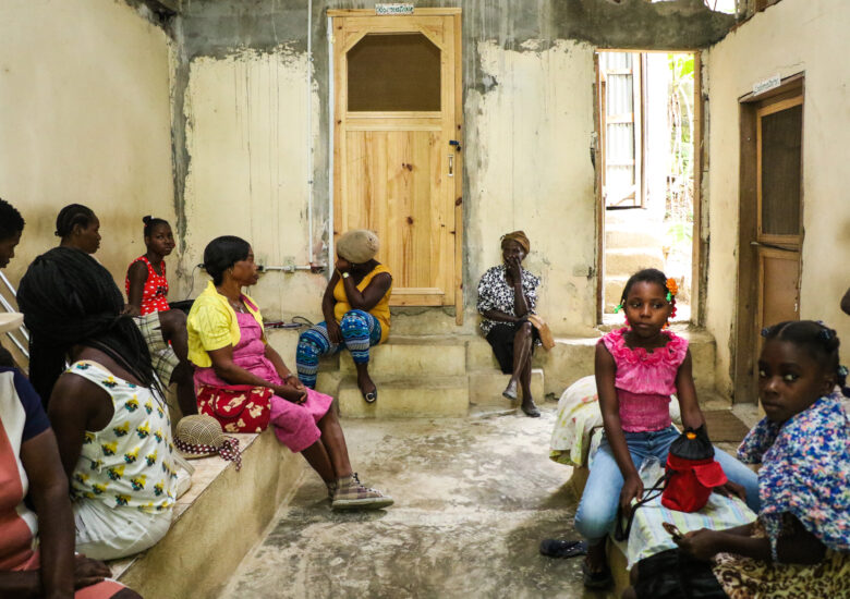 Patients waiting in the waiting room at Sante 2000, Dr. Manno's clinic, in Haut Limbe, Haiti.